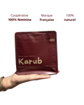 sachet poudre de caroube avec ecrit 100 pourcent naturel, cooperative 100 pourcent feminine et marque française
